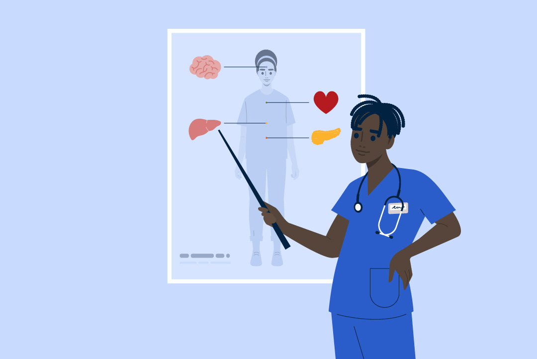 health care worker pointing to illustration of human anatomy