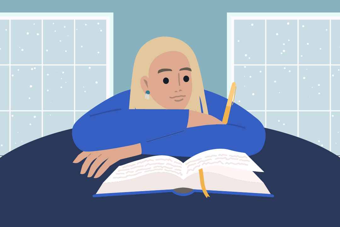 person journaling during winter weather