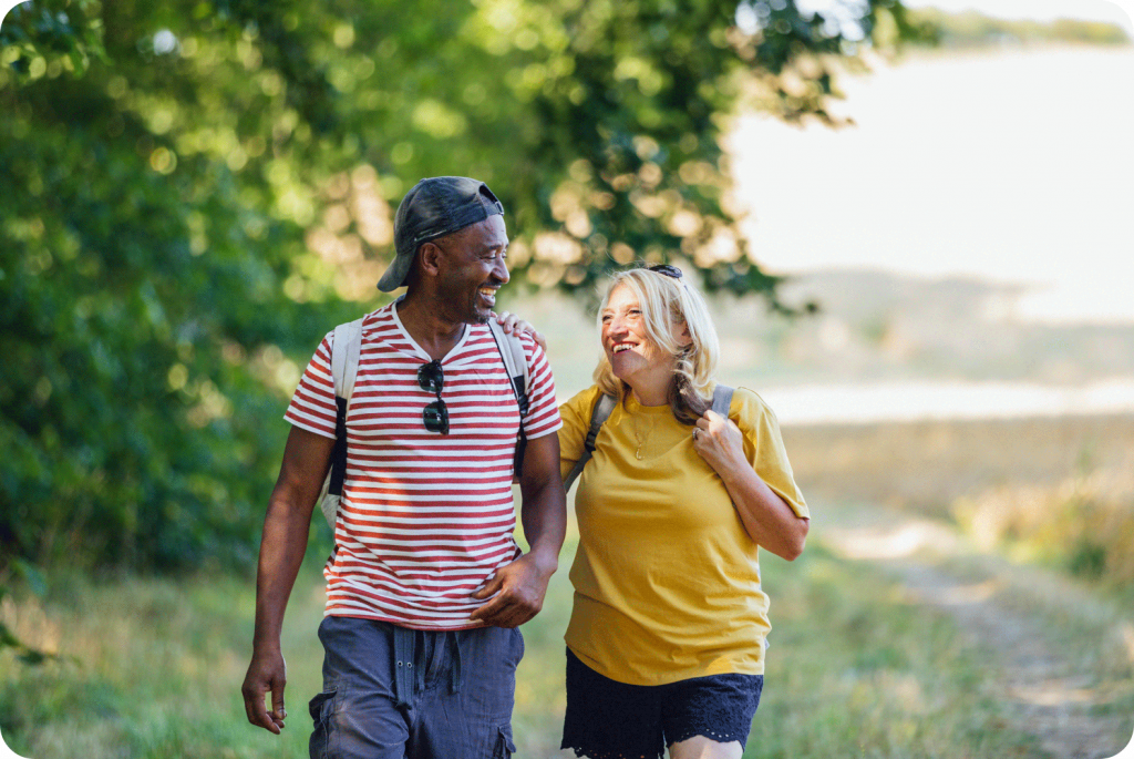 a couple walking on a trail