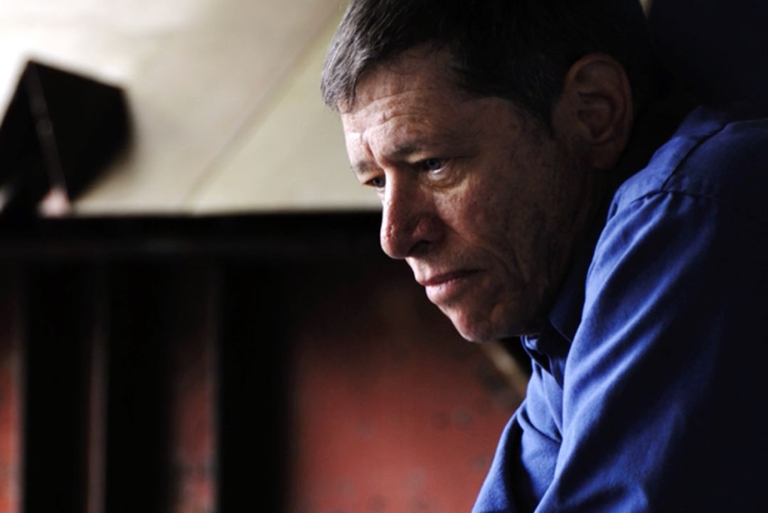 person staring off pensively yet numbly